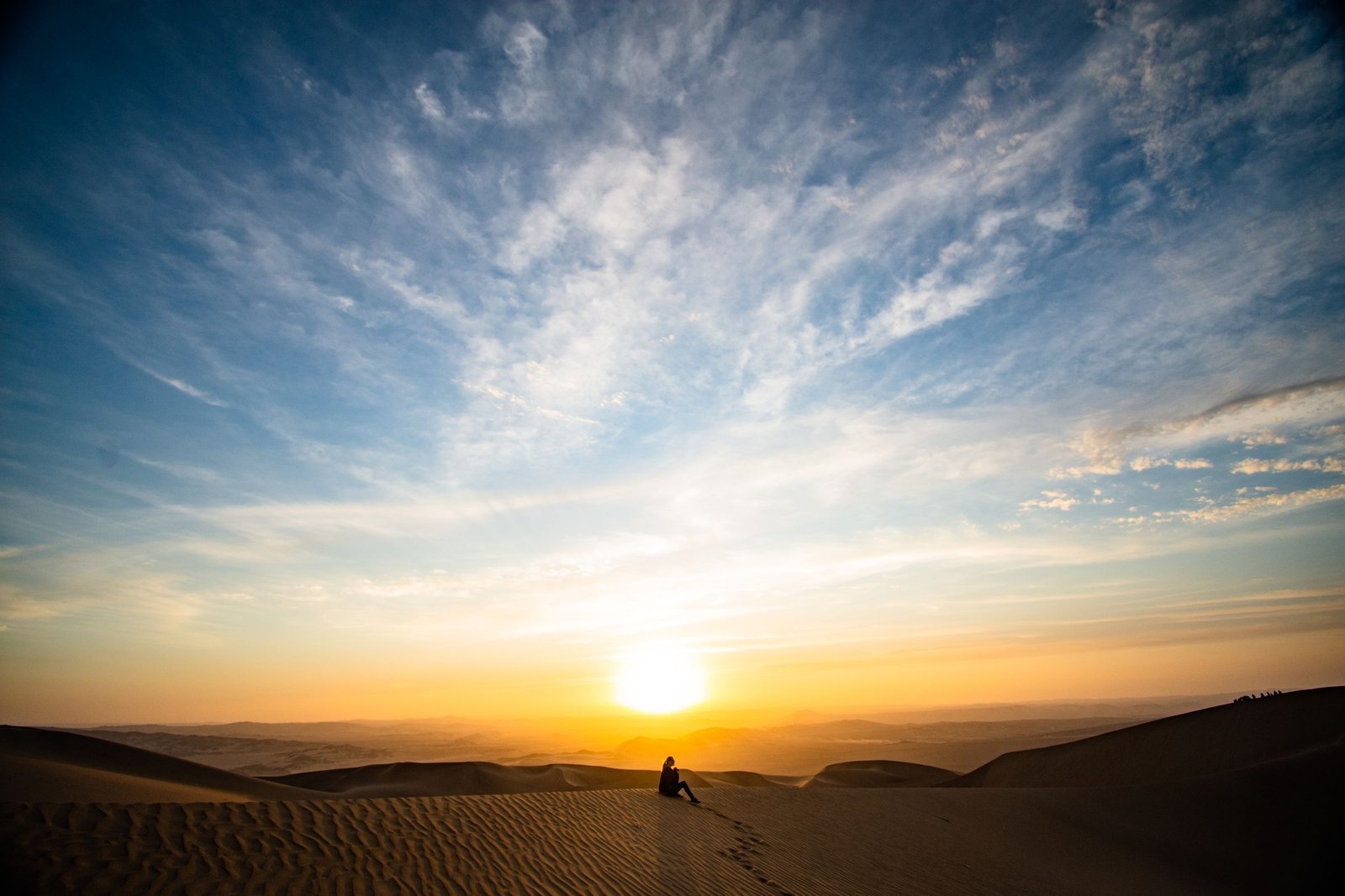 Sand dunes in warm golden-hour light