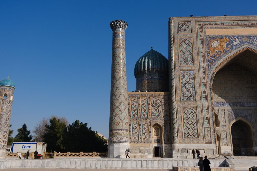 The blue-tiled madrasa facades of the Registan in Samarkand