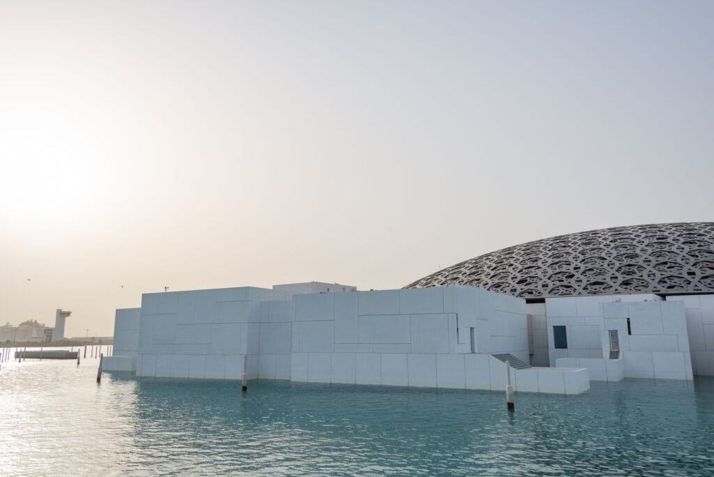 The dome of the Louvre Abu Dhabi at dusk