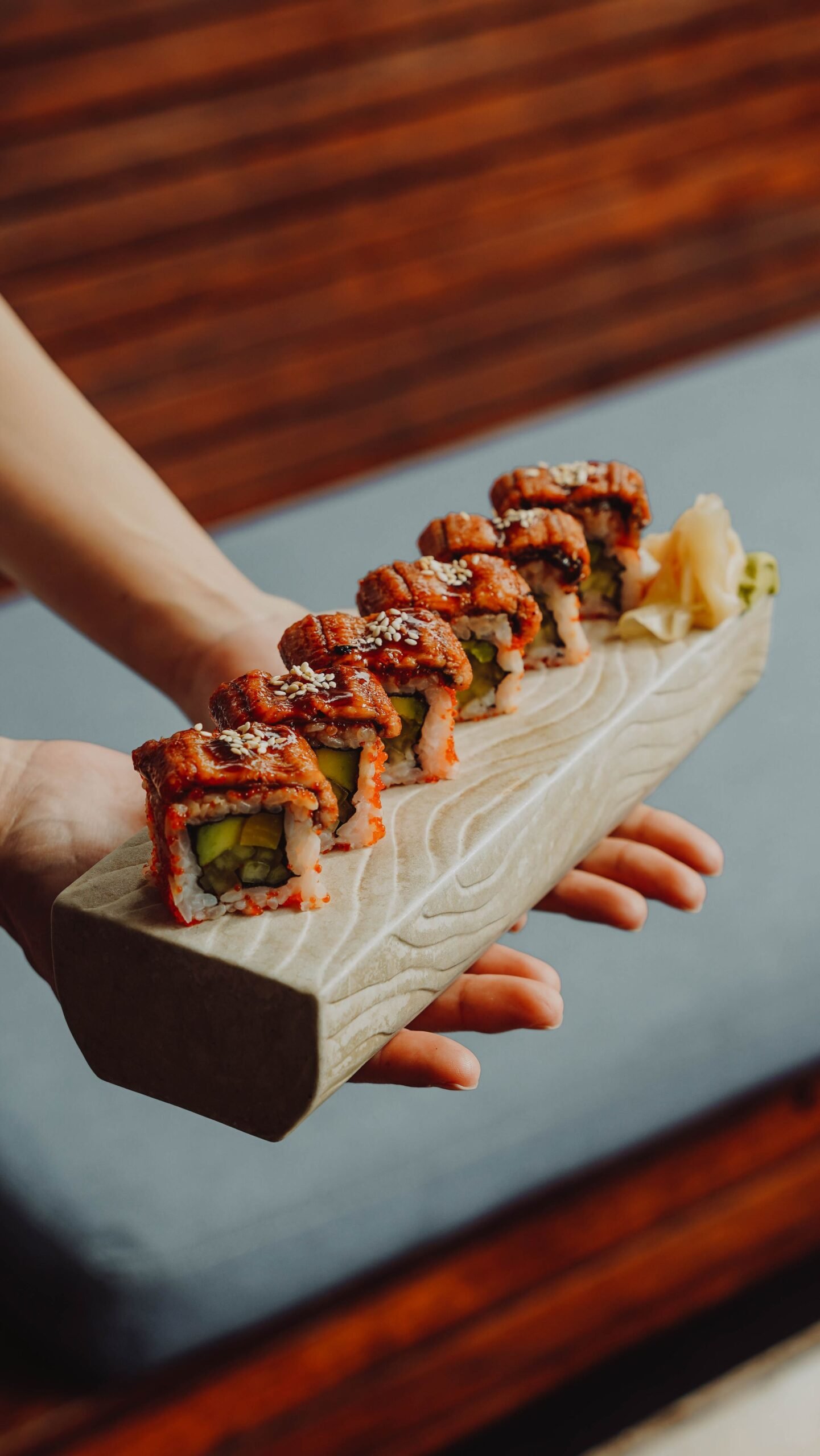 Japanese hand rolls arranged on a counter