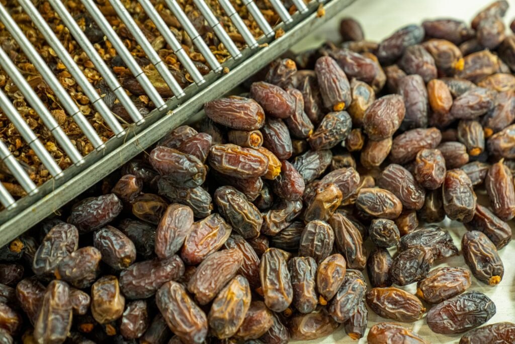 Piles of dates on display at a market stall