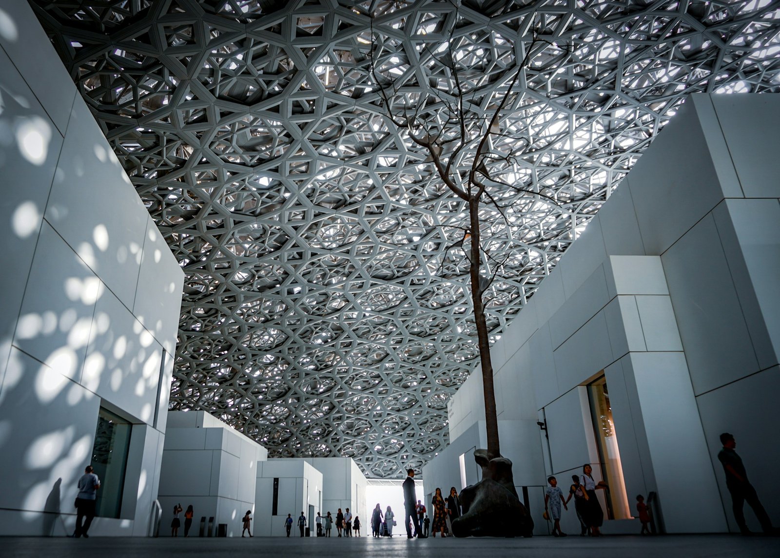 Light falling through the dome of the Louvre Abu Dhabi