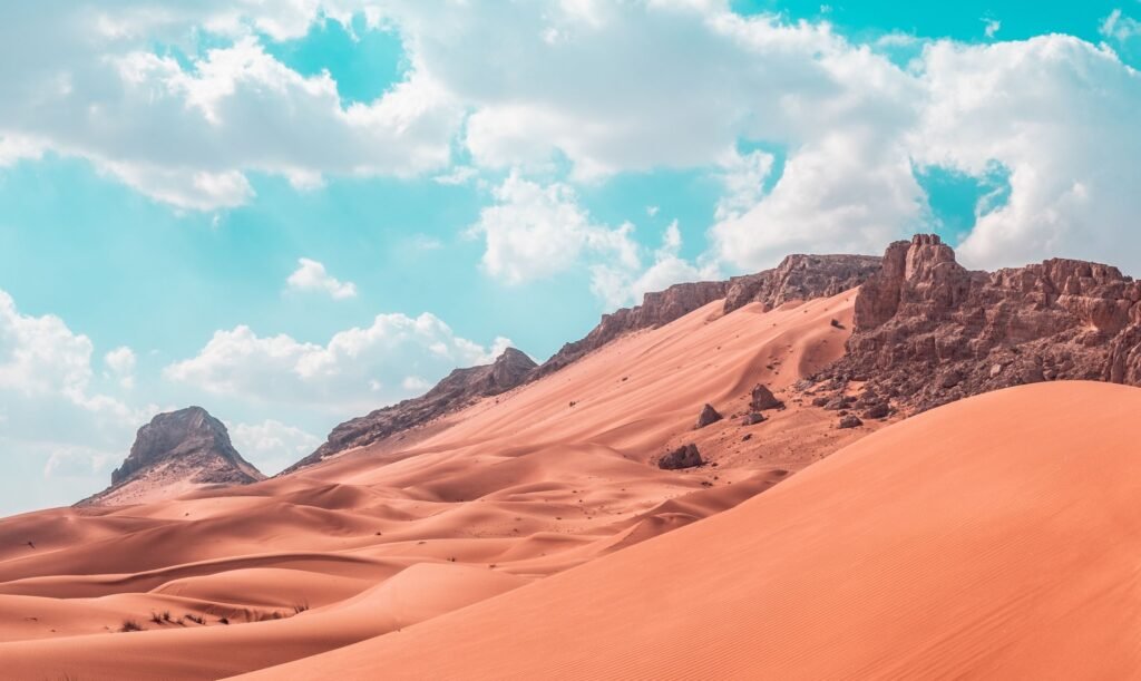 Tall red sand dunes in the Empty Quarter at sunset