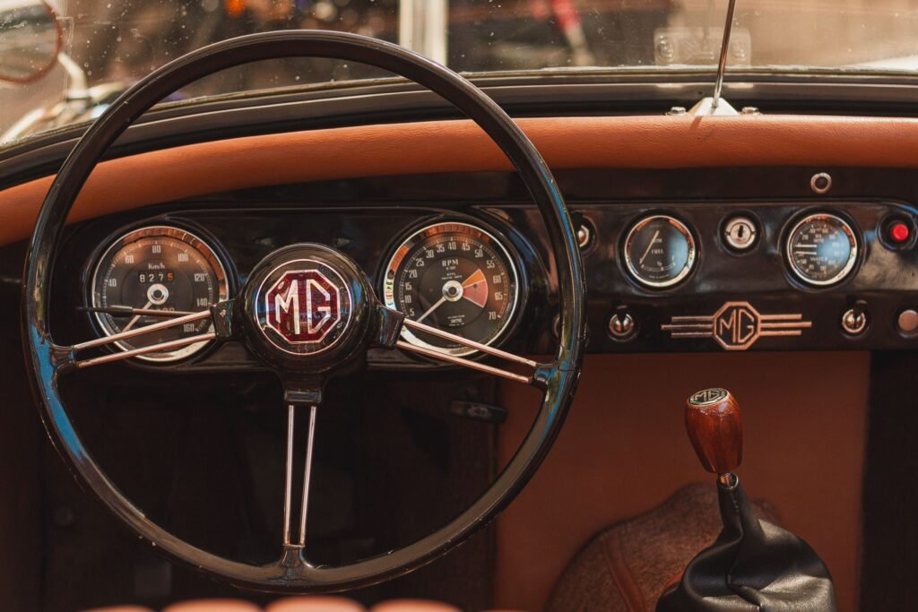 The dashboard of a Porsche 911 with its row of round dials