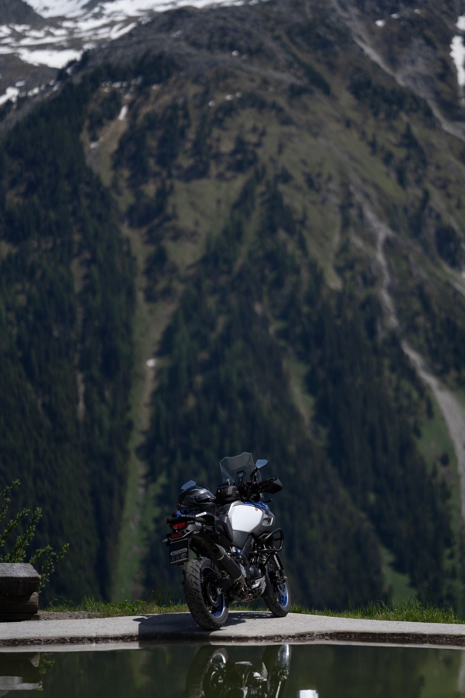 An adventure motorcycle on a winding mountain road