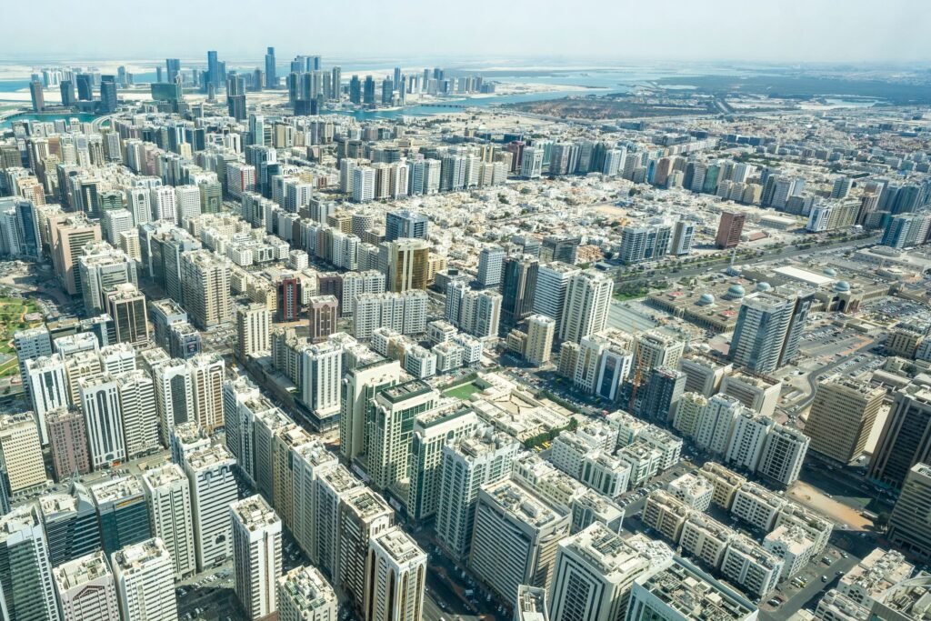Abu Dhabi's towers and coastline seen from above