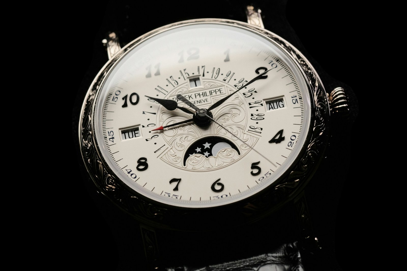 A Patek Philippe Grand Complications watch photographed against a dark background