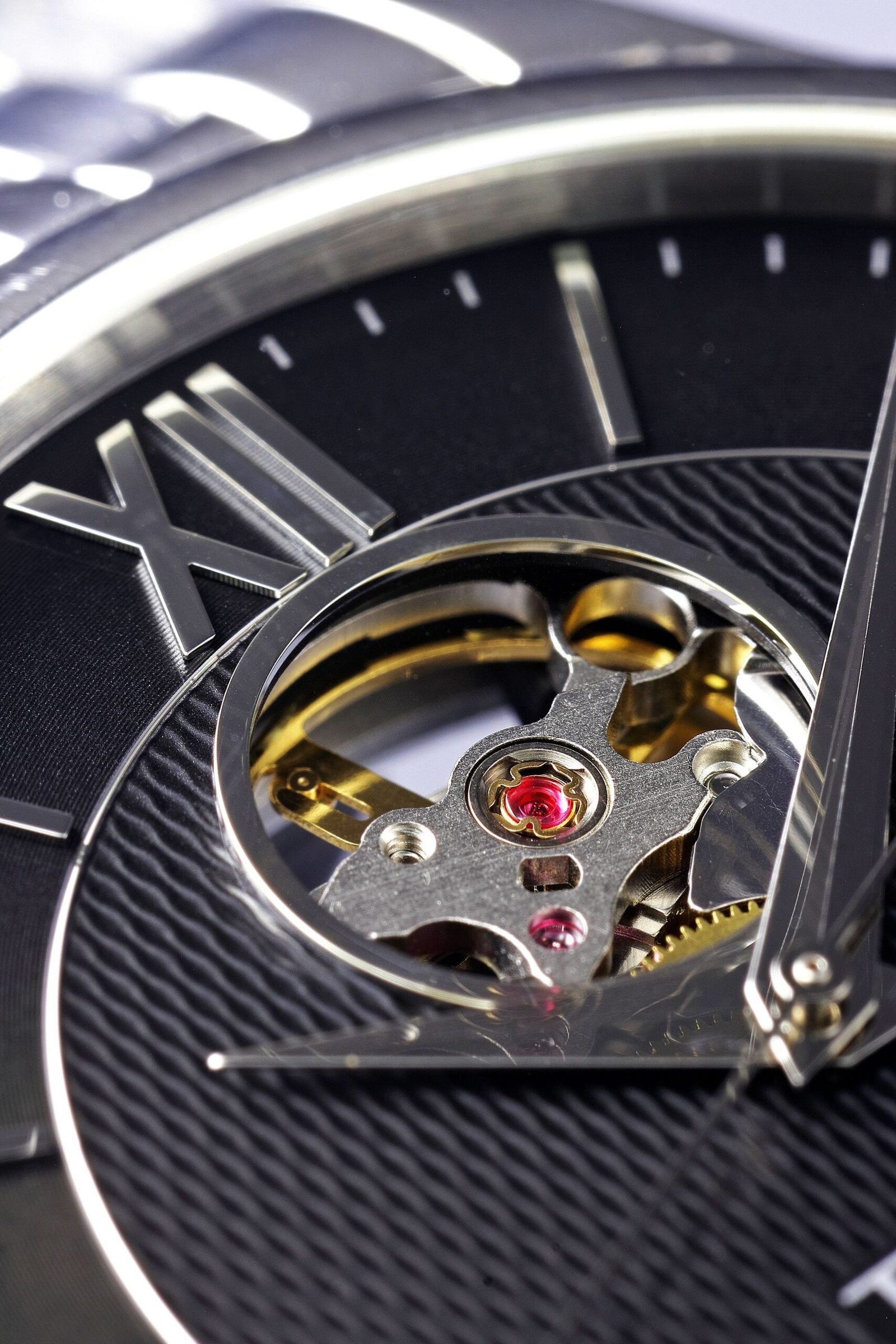 Macro view of a luxury watch dial with Roman numerals