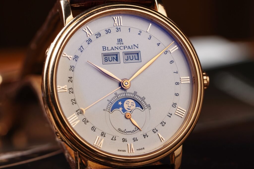 Close view of an analogue watch dial
