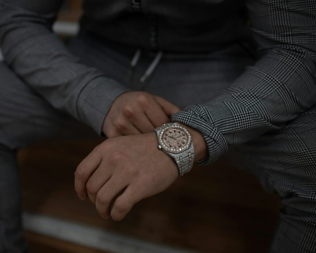 A steel sports watch worn on the wrist