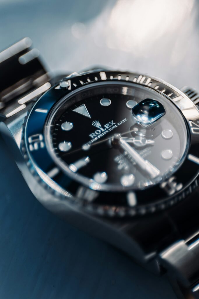 Close view of a Submariner dial, hands and graduated bezel
